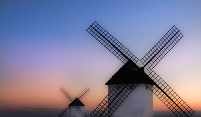 windmill at sunset in La Mancha, Spain
