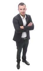 in full growth. confident businessman looking at the camera