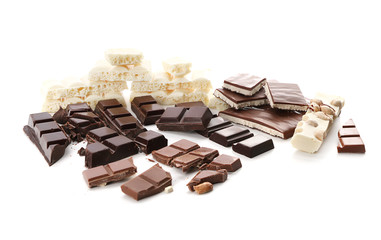 Different chocolate pieces on white background
