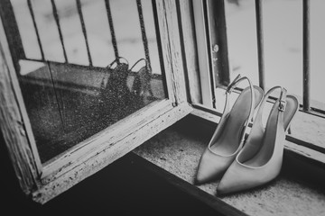 White Bride shoes on Window