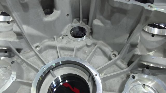 Cast aluminum transmission housing. The holes are machined on the CNC machine.