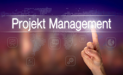 A businessman pressing a Project Management 