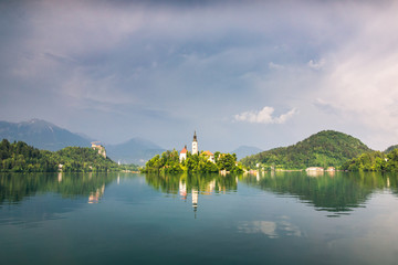 Fototapeta premium Church on the island on Lake Bled at sunny day, Slovenia