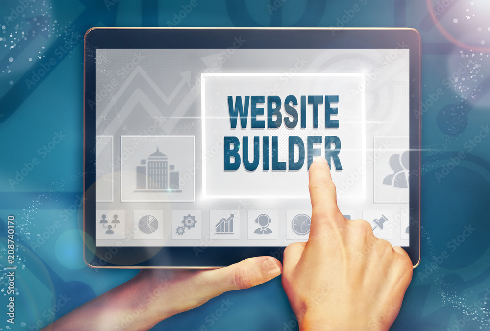 Wall mural a hand selecting a website builder business concept on a computer tablet screen with a colorful back