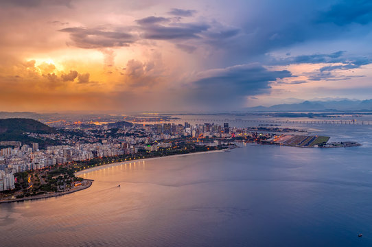 Sunset aerial view of Centro (downtown of Rio de Janeiro), Flamengo, Gloria and Guanabara bay Rio de Janeiro, Brazil