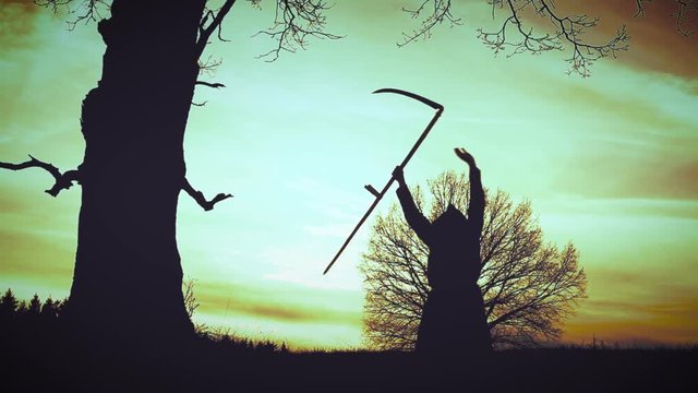 At sunset there is a grim Reaper