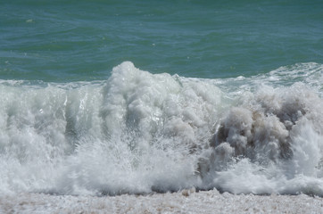 Waves breaking on a beach