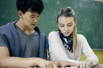 Students working together in in math class