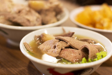 Bak Kut Teh in the white bowl on the table