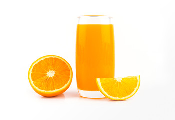 Slices of orange and glass of orange juice on white background