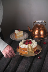 cake, dessert, rustic style, cherries, male hand, slice on plate