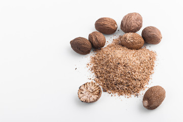 aromatic nutmeg on a white acrylic background