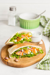 Pita with chicken, vegetables and sauce, delicious lunch, fast food, stuffed roll