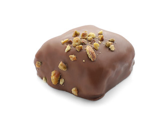 Tasty chocolate candy with nuts on white background