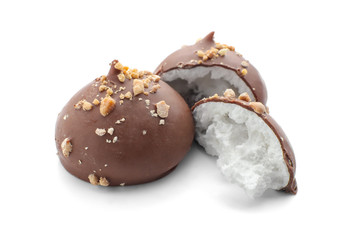 Tasty candies with milk chocolate on white background