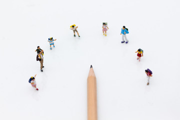 Miniature people: Children's group with teaching equipment. Image use for back to school