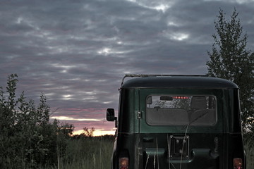 Evening, summer nature, while traveling on a high-terrain vehicle, over hilly terrain and inland roads. © jakov