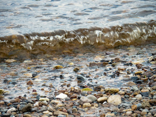 wave covering the beach