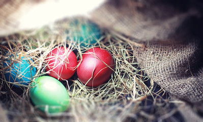 Easter painted eggs on burlap