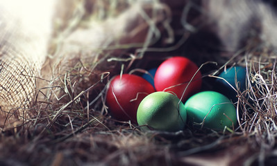 Easter painted eggs on burlap
