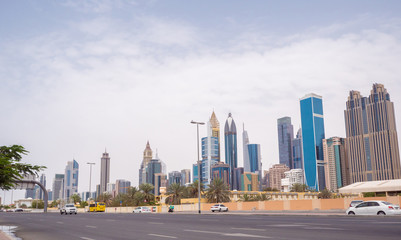 Fototapeta na wymiar Panorama of the city center of Dubai. Beautiful skyscrapers in cloudy weather.