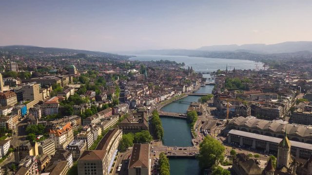 sunny day zurich cityscape river central train station aerial panorama 4k timelapse switzerland
