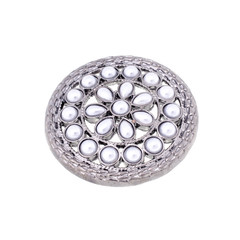 round brooch with pearls isolated on white