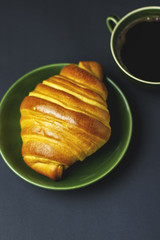 breakfast with fresh croissant and coffee