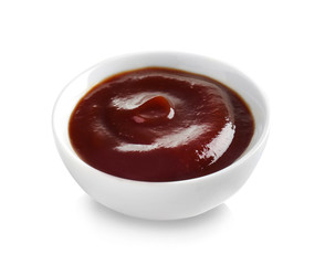 Bowl with barbecue sauce on white background