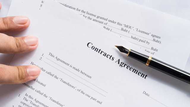 contract agreement document for sign with pen