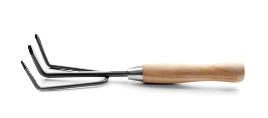 Metal rake for gardening on white background