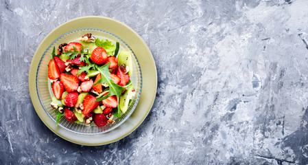 Fototapeta na wymiar bowl of salad with strawberry