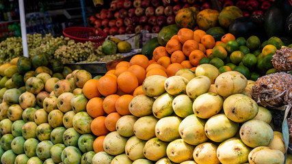 Naklejka na ściany i meble Fruits in the market at kerala, India.