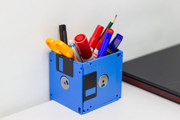 recycle floppy disk, Creative objects used for Store supplies such as pen pencils Scissors in a box on the table in work office, concept recycle floppy disk 