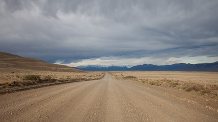 Fototapeta na wymiar Long dirt road in Patagonia