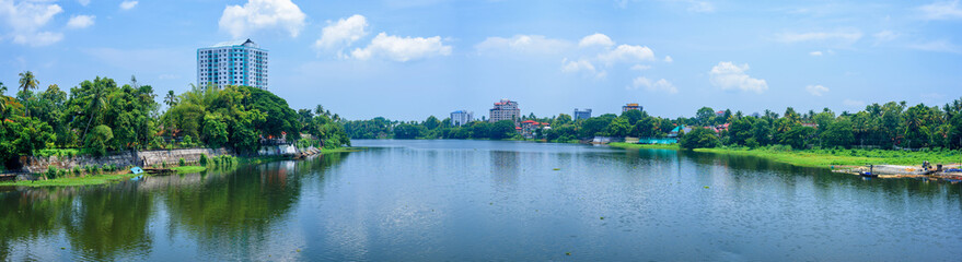Fototapeta na wymiar Panoramic river view and cityscapes of Kerala, India.