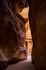 View through gorge onto Treasury Building in Petra in Jordan