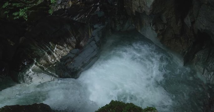 Stanghe Waterfall, a gorge deeply incised in the marble in the Italian Alps.
