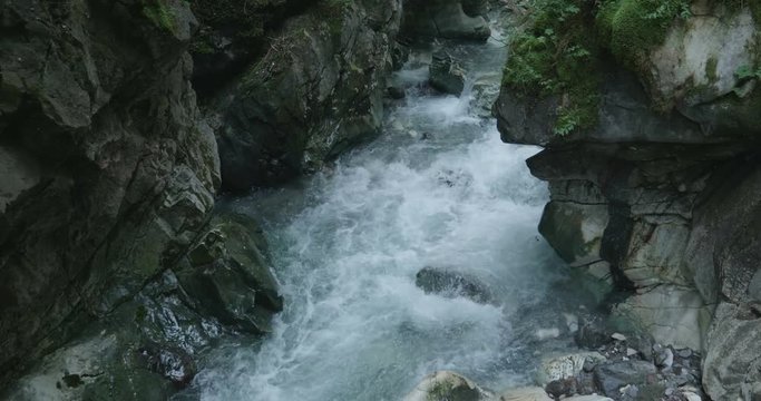 Stanghe Waterfall, a gorge deeply incised in the marble in the Italian Alps.

