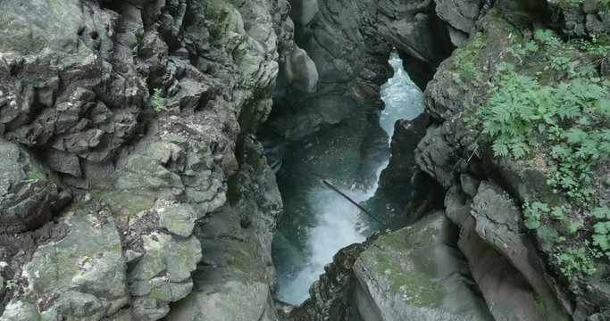 Stanghe Waterfall, a gorge deeply incised in the marble in the Italian Alps.
