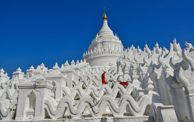 A Buddhist novice monk at white temple