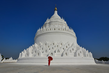 A Buddhist novice monk at white temple