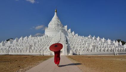 A Buddhist novice monk at white temple