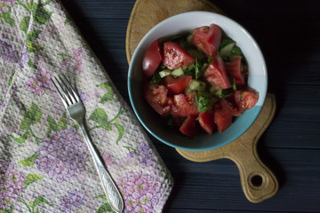 Healthy food on a cuisine table. The bowl with salad on the table.