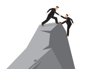 Business man helping another to reach the top of the cliff. Business concept of teamwork, leadership or relationship.