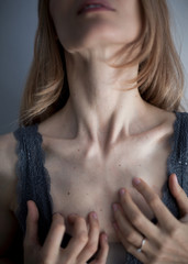 Portrait of a young woman with lingerie. Collarbones. Close-up. Fashion