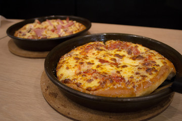 Double cheese Pizza on tray.