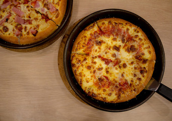 Double cheese Pizza on tray.