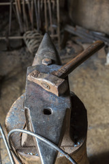 Old Sledge on an anvil in a workshop