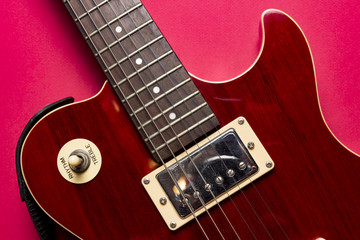 Naklejka na ściany i meble Closeup view of vintage classic electric rock les paul guitar